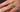 Close-up of a vintage French yellow gold diamond ring featuring a domed band pavé-set with sparkling round diamonds, shown worn on a hand.