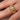 Close-up of a vintage French yellow gold diamond ring featuring a domed band pavé-set with sparkling round diamonds, shown worn on a hand.