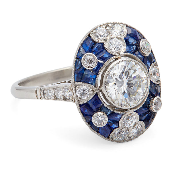 Art Deco Inspired 0.81 Carat Round Brilliant Diamond and Sapphire Platinum Ring