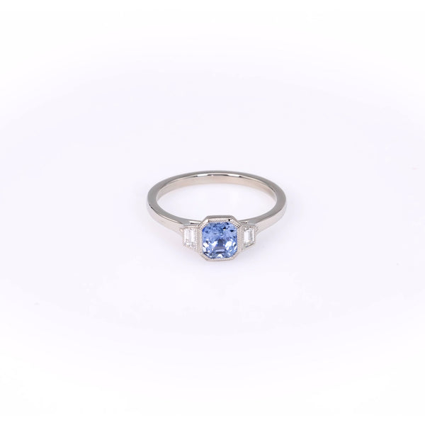 1.10 Carat Sapphire and Diamond Platinum Bezel Set Three Stone Ring