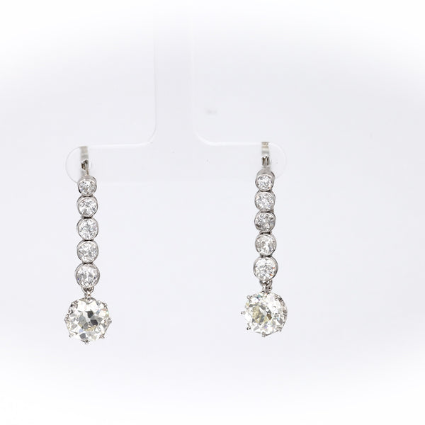 Pair of Art Deco GIA 7.00 Carat Total Weight Old Mine Cut Diamond Platinum Earrings