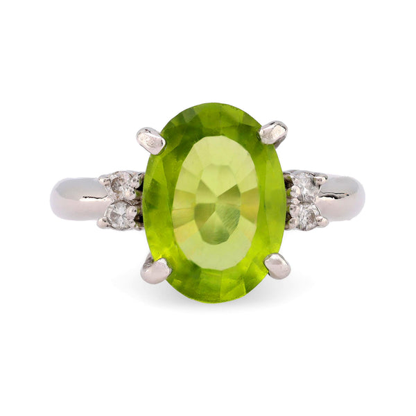 Vintage 3.40 carat peridot diamond platinum cocktail ring  Jack Weir & Sons   