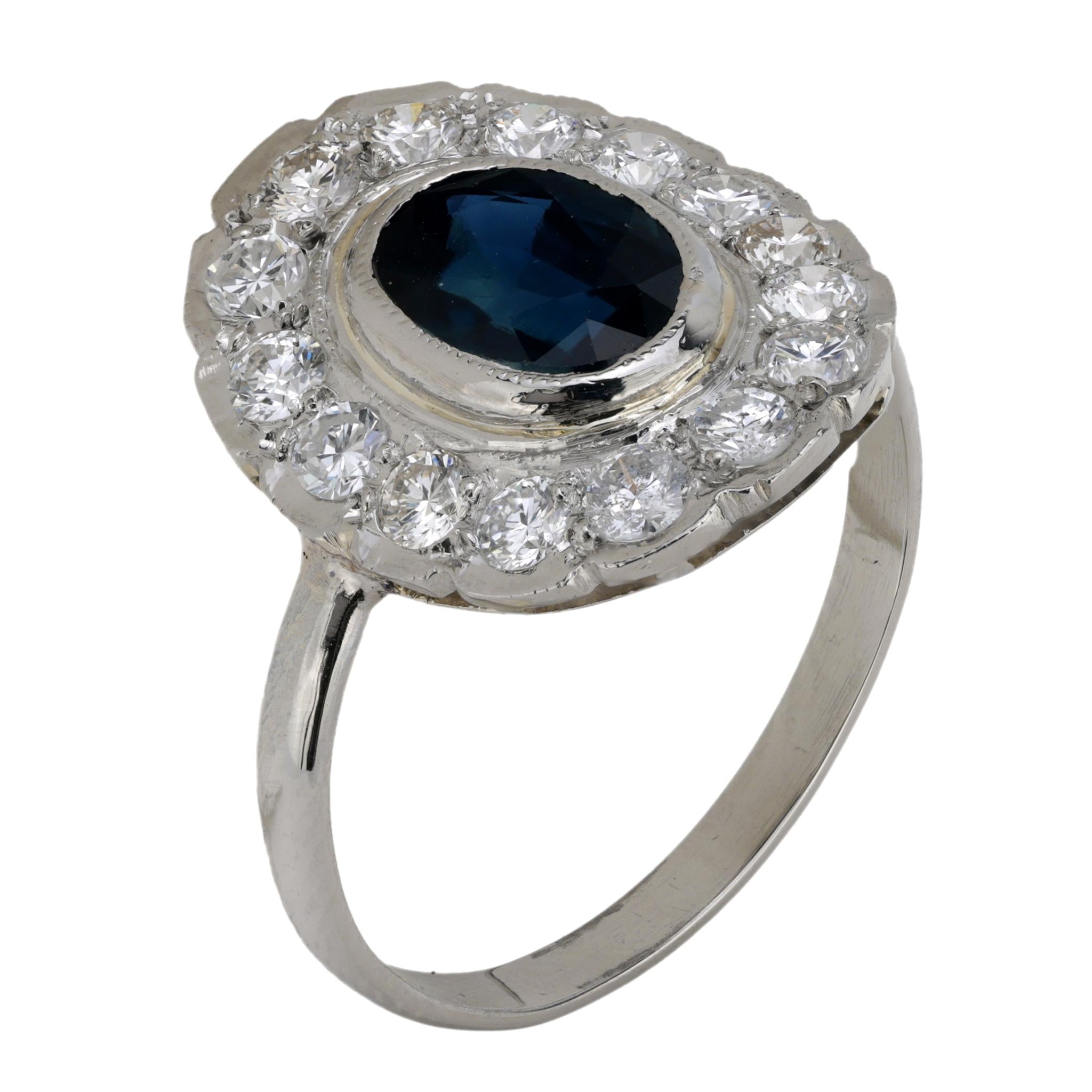 Vintage sapphire diamond platinum cluster ring