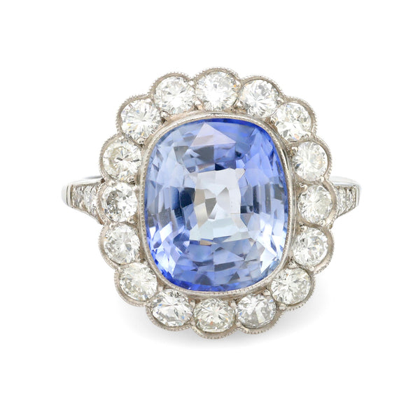 Vintage 5.70 carat sapphire diamond platinum halo ring