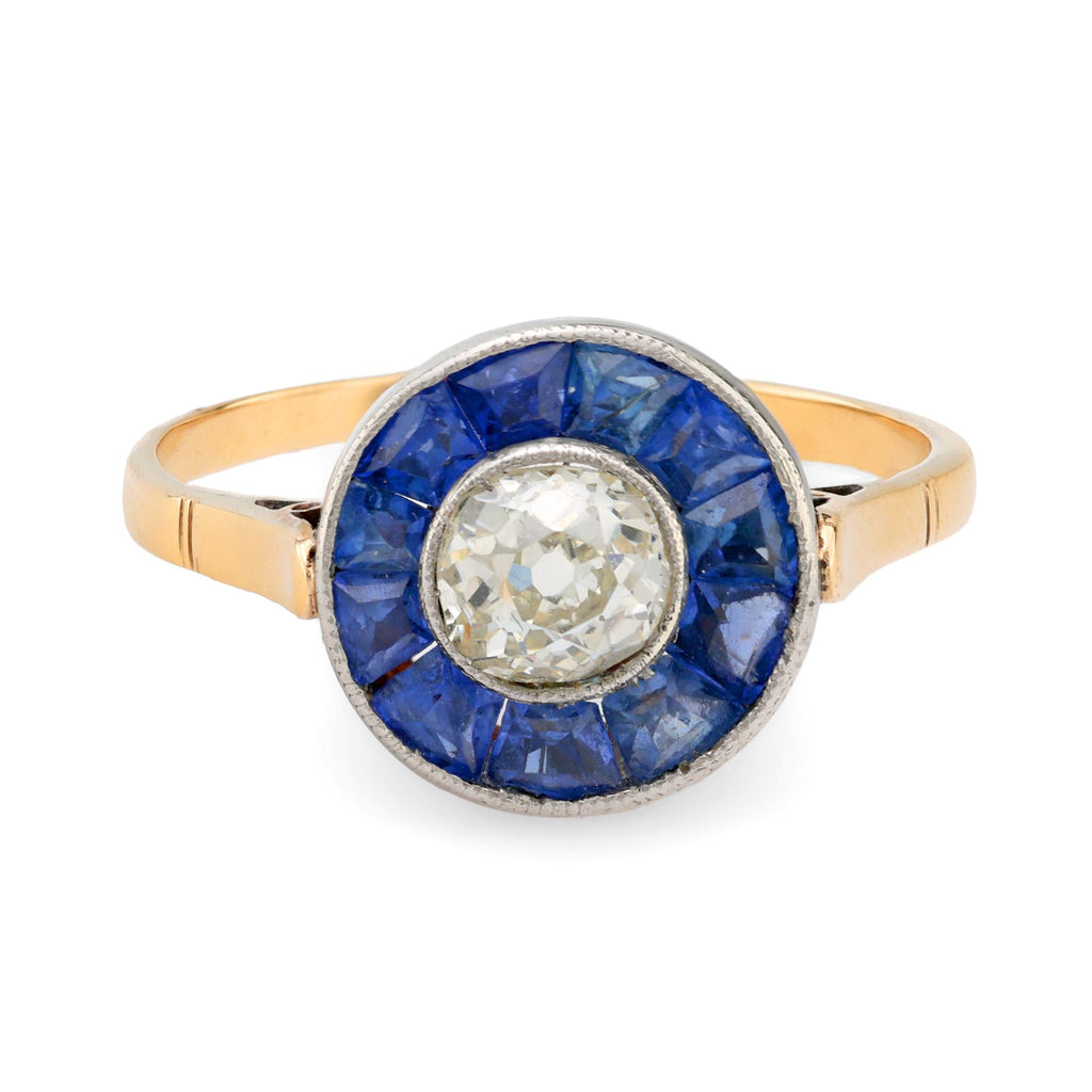 Art Deco style diamond sapphire 18k gold and platinum halo ring