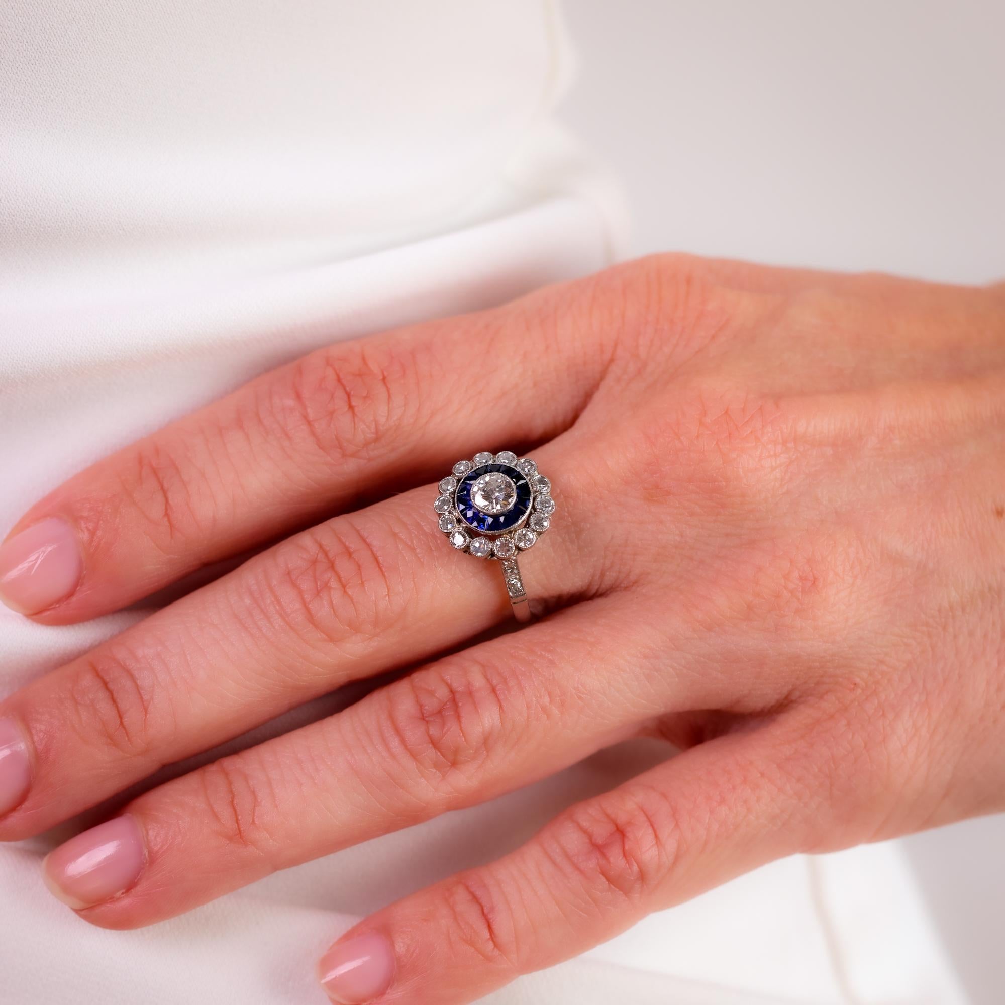 Art Deco style 0.35 carat diamond sapphire platinum target ring