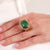 Contemporary 3.50 carat invisible set emerald diamond 18k yellow gold ring Jack Weir & Sons