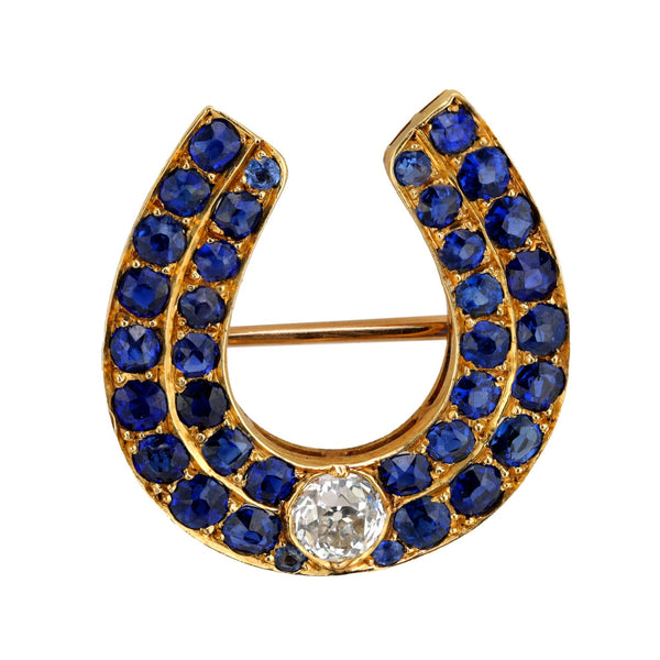 Victorian diamond sapphire 18k yellow gold horseshoe brooch