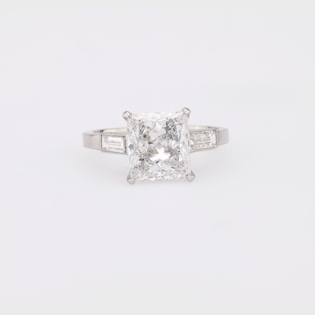 Striking GIA 3.02 carat rectangular cut diamond platinum engagement ring