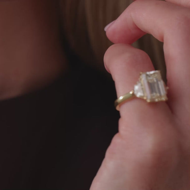 GIA 5.65 carat emerald cut diamond 18k yellow gold engagement ring