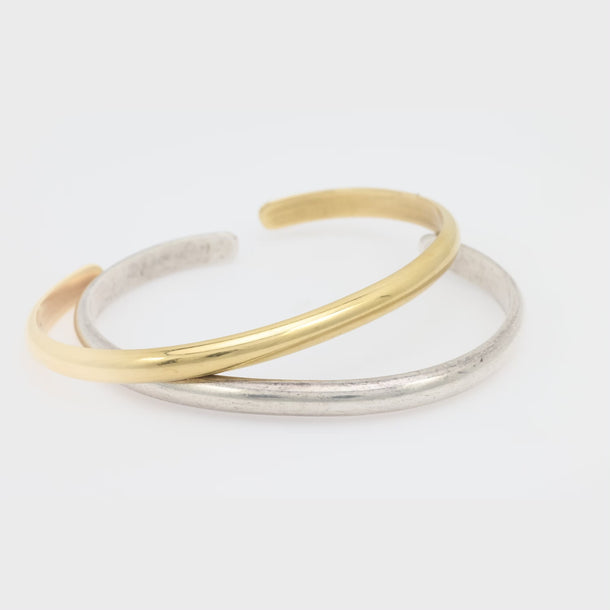 Vintage pair of 18k gold and silver bangle bracelets Jack Weir & Sons