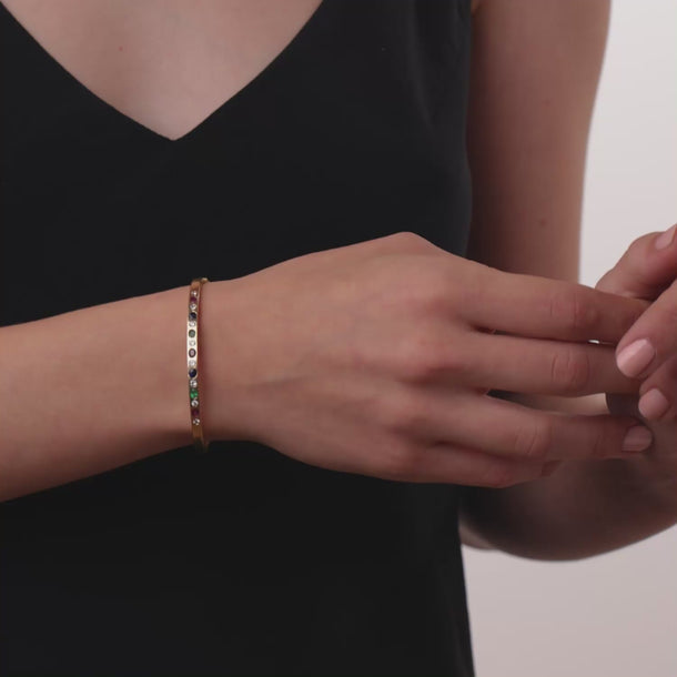 Vintage diamond ruby emerald sapphire 14k yellow gold bangle
