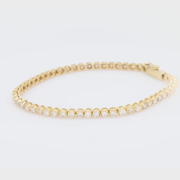 Contemporary 4 carat total weight diamond 14k yellow gold tennis bracelet