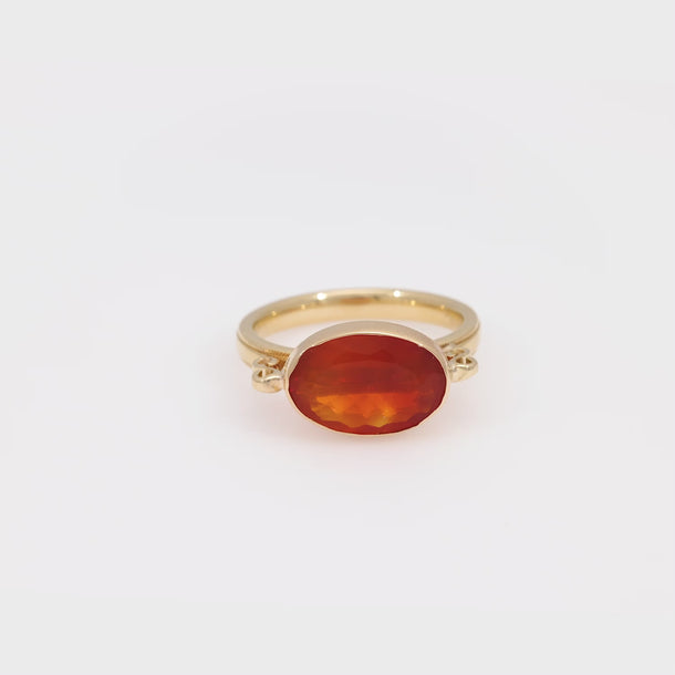 Contemporary 2.60 carat fire opal 14k yellow gold bezel ring Jack Weir & Sons