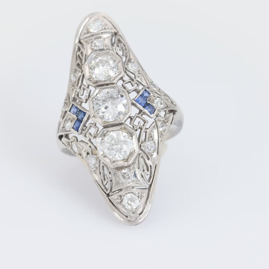 Art Deco 1.5 carat total weight diamond sapphire platinum Navette ring Jack Weir & Sons