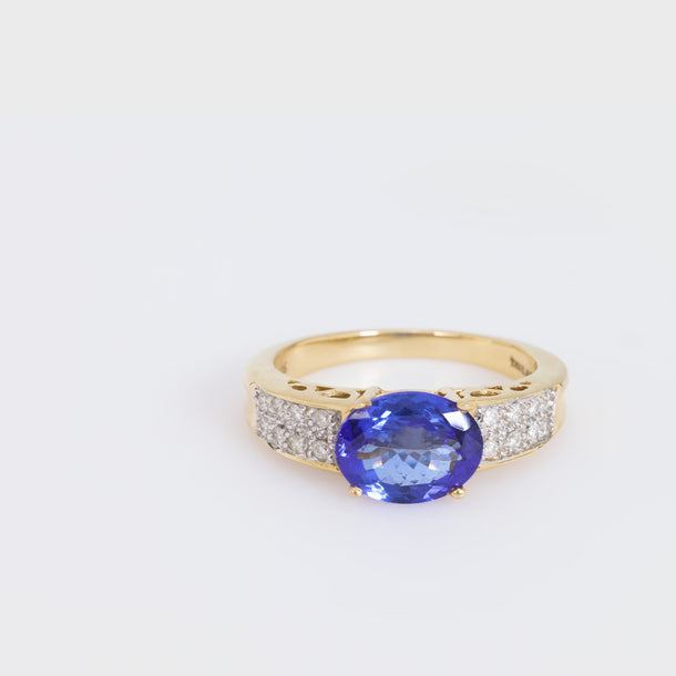 Vintage 2.10 carat oval cut tanzanite diamond 14k yellow gold ring Jack Weir & Sons