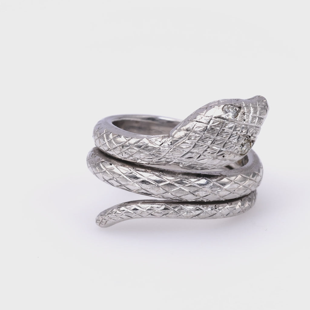 One Mid-Century Austrian Diamond 14k White Gold Snake Ring.