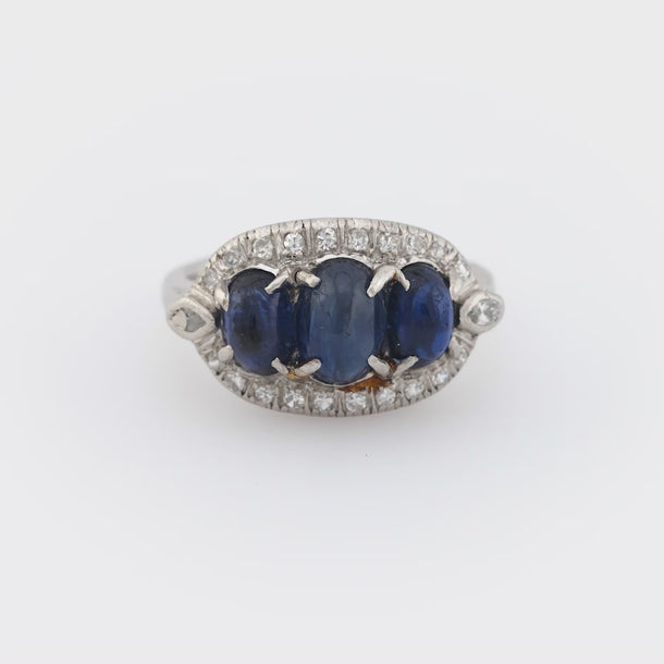 Edwardian 3.20 carat cabochon cut sapphire diamond platinum 3 stone ring Jack Weir & Sons