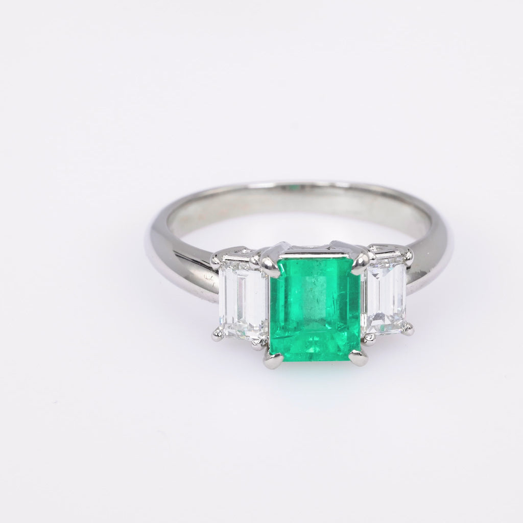 Vintage 1.30 Carat Emerald Diamond Platinum Three Stone Ring