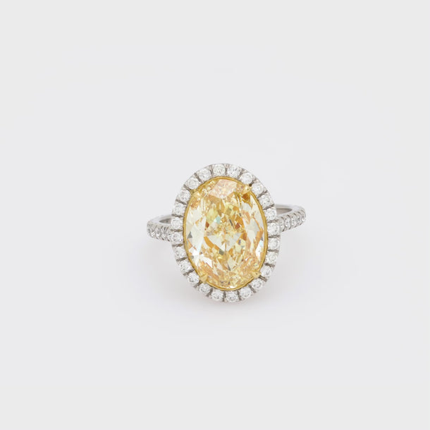 GIA 5.07 carat fancy light yellow diamond platinum engagement ring Jack Weir & Sons